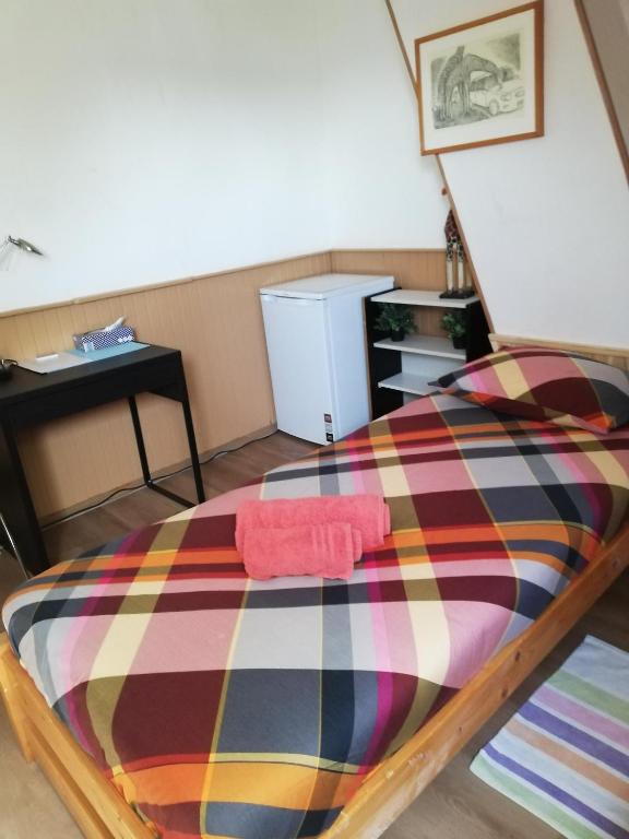 Postel nebo postele na pokoji v ubytování Residentie Blijdorp