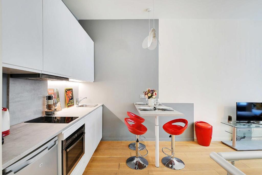Cucina o angolo cottura di Charming refurbished studio -MaraisBeaubourg