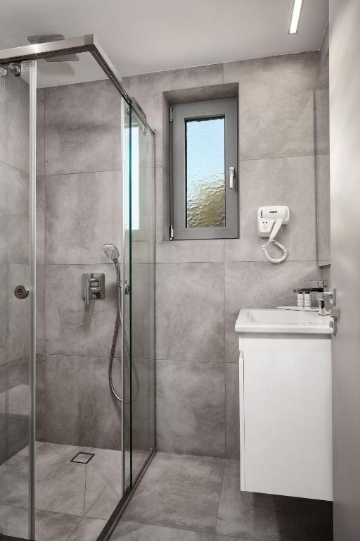 Koupelna v ubytování Quattro Suites