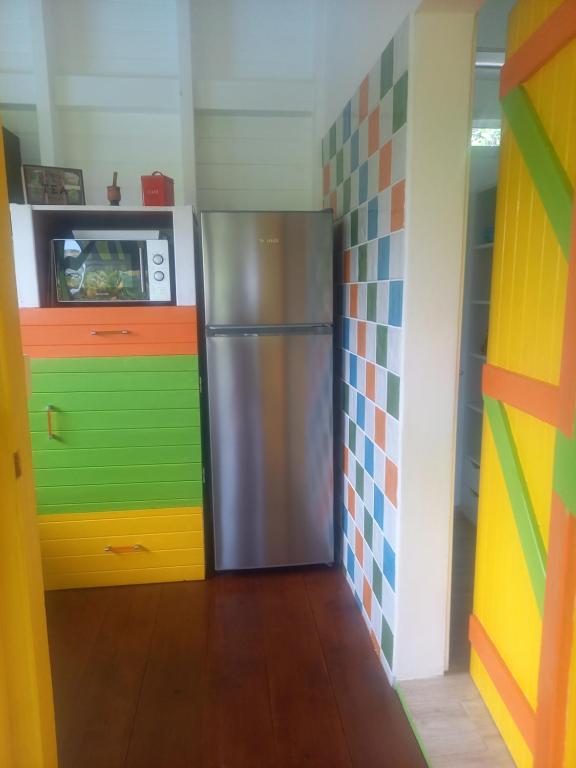 Kuchyň nebo kuchyňský kout v ubytování Bungalow de charme