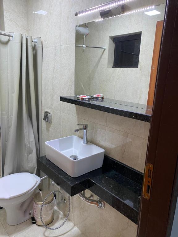 Koupelna v ubytování España Suites Hotel