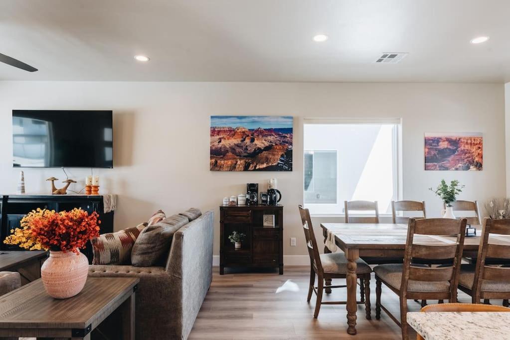 a living room with a couch and a table at Grand Canyon-4bed,3bath,hot tub in Hildale