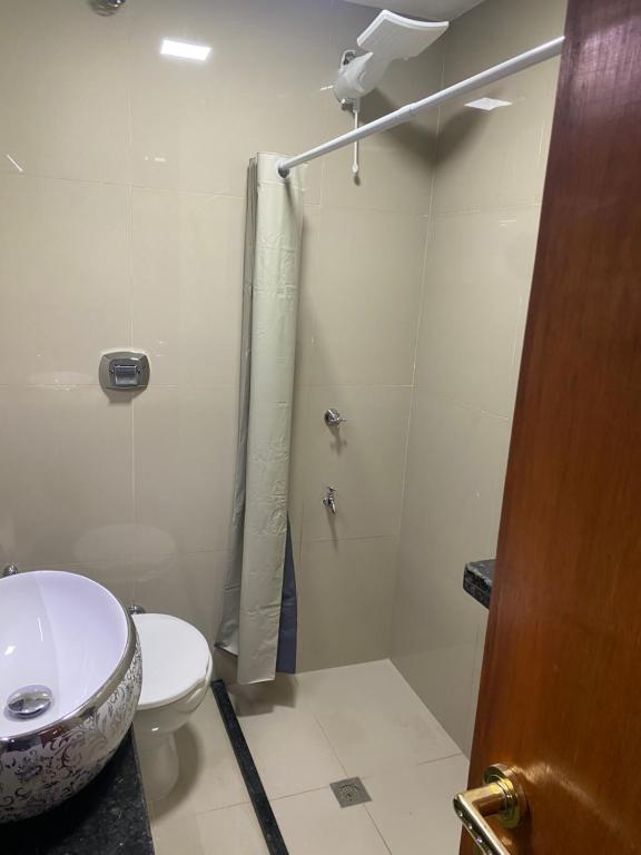 Koupelna v ubytování España Suites Hotel