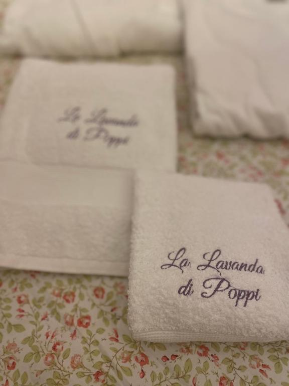 Postel nebo postele na pokoji v ubytování La lavanda di Poppi-mini appartamento