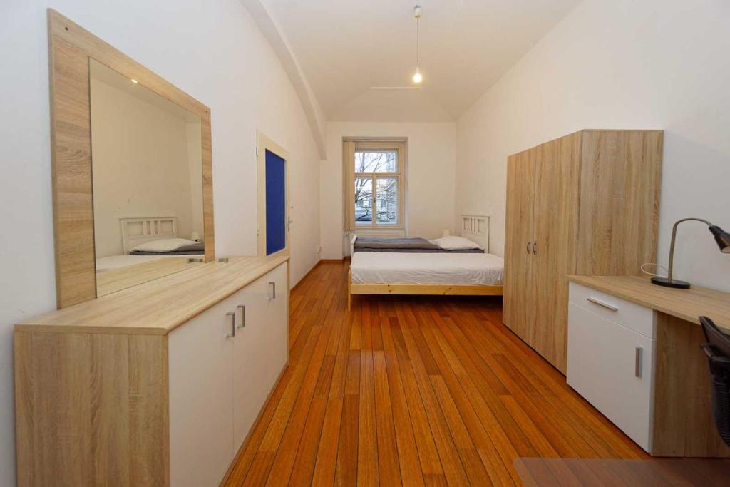 Postel nebo postele na pokoji v ubytování Apartment Americká 8