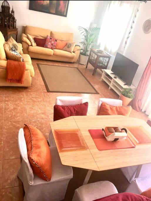 Posezení v ubytování Duplex 3 dormitorios con parking privado