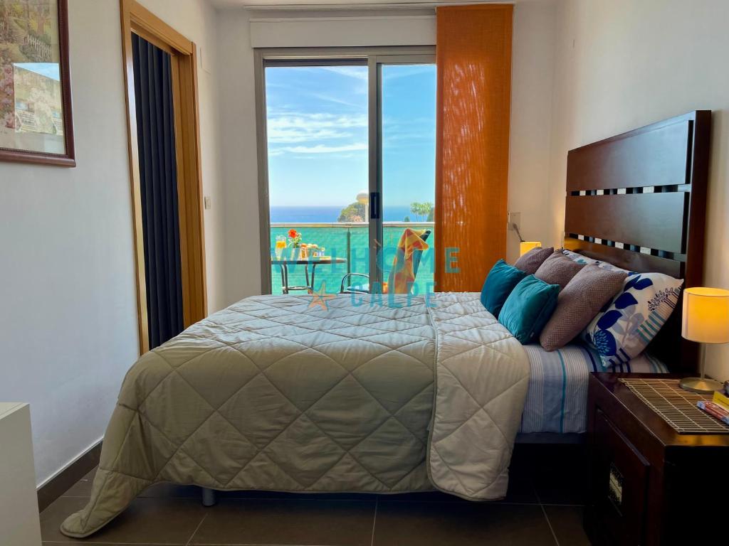 Posteľ alebo postele v izbe v ubytovaní LIMA con piscina y vista al mar