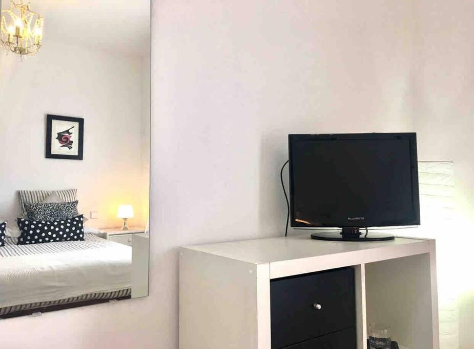 TV a/nebo společenská místnost v ubytování Duplex 3 dormitorios con parking privado