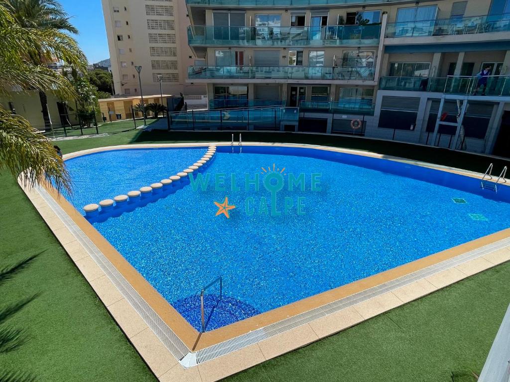 Bazén v ubytovaní LIMA con piscina y vista al mar alebo v jeho blízkosti