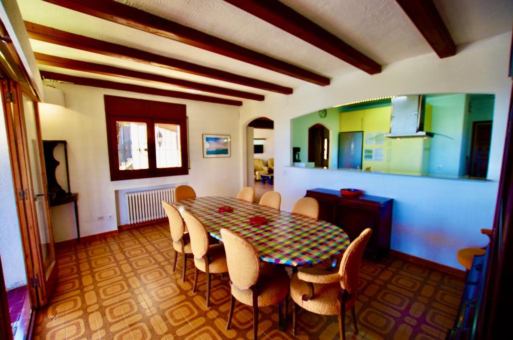 Kuchyňa alebo kuchynka v ubytovaní V&V LLORET- VILLA MEDITERRANIA, vistas panorámicas al mar