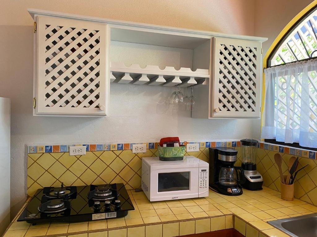 Kuchyň nebo kuchyňský kout v ubytování Casa Maiana