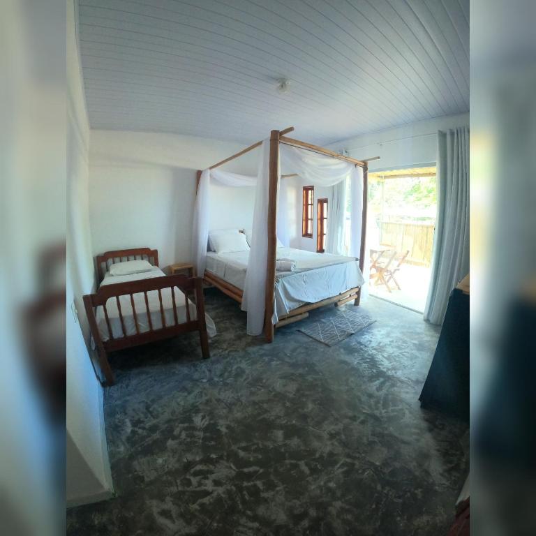Postel nebo postele na pokoji v ubytování Pousada Siriba