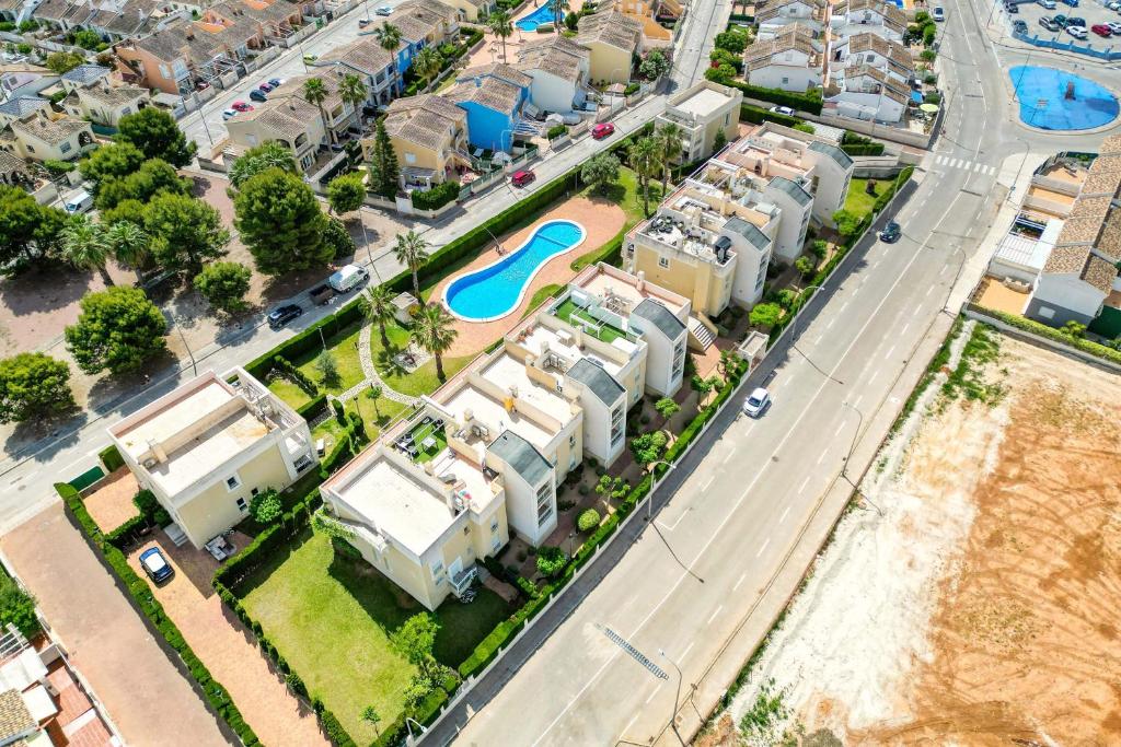 an aerial view of a neighbourhood with houses and a road at Luxury Apt, Beach, Pool open 365 days, Near Javea & Denia in El Verger