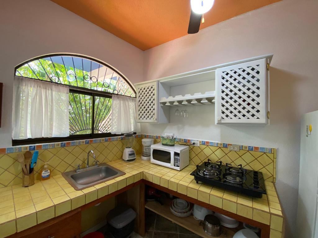 Kuchyň nebo kuchyňský kout v ubytování Casa Maiana