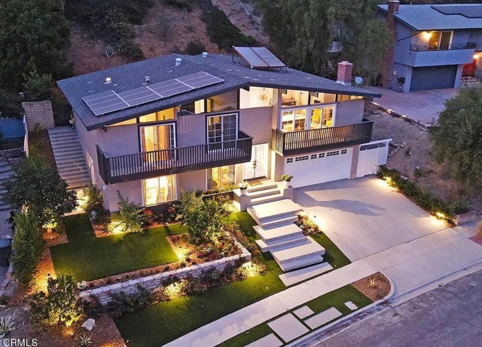 an aerial view of a house with solar panels on it at Contemporary Zen Place - Entire First Floor in Thousand Oaks