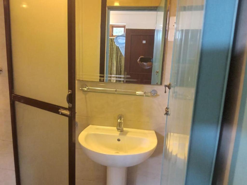 Koupelna v ubytování Hotel Shalini