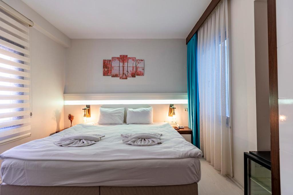Postel nebo postele na pokoji v ubytování Stanpoli Hostel