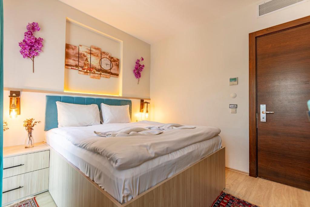 Postel nebo postele na pokoji v ubytování Stanpoli Hostel