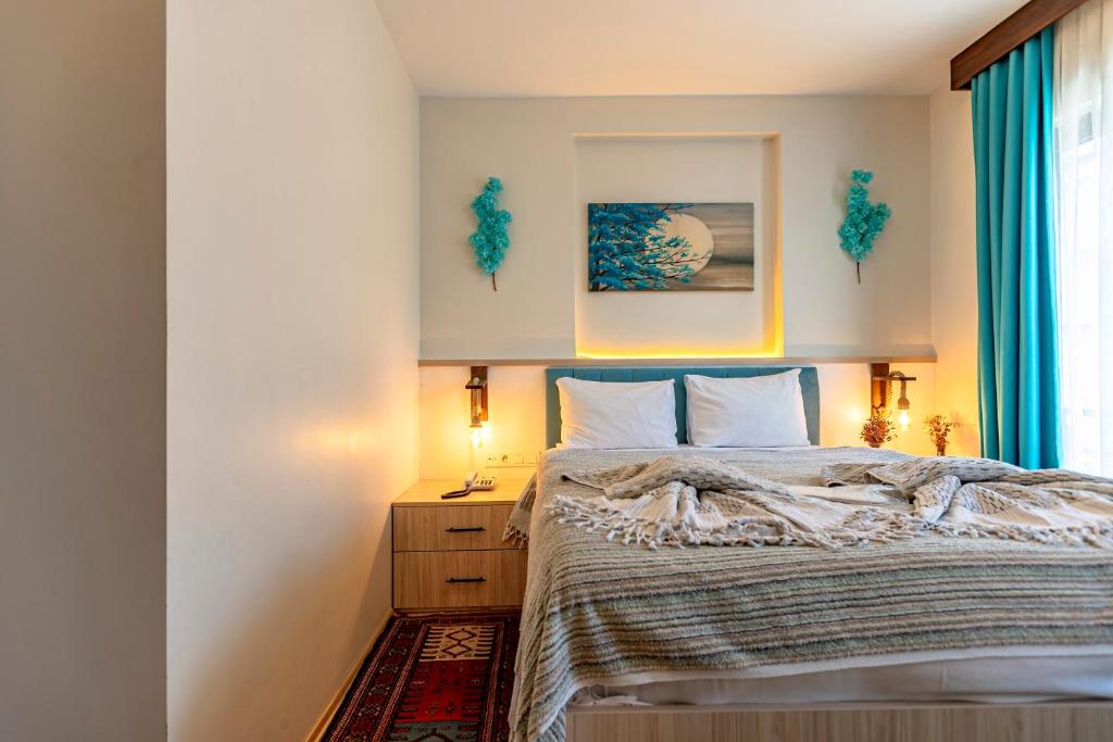 Postel nebo postele na pokoji v ubytování Stanpoli Hostel