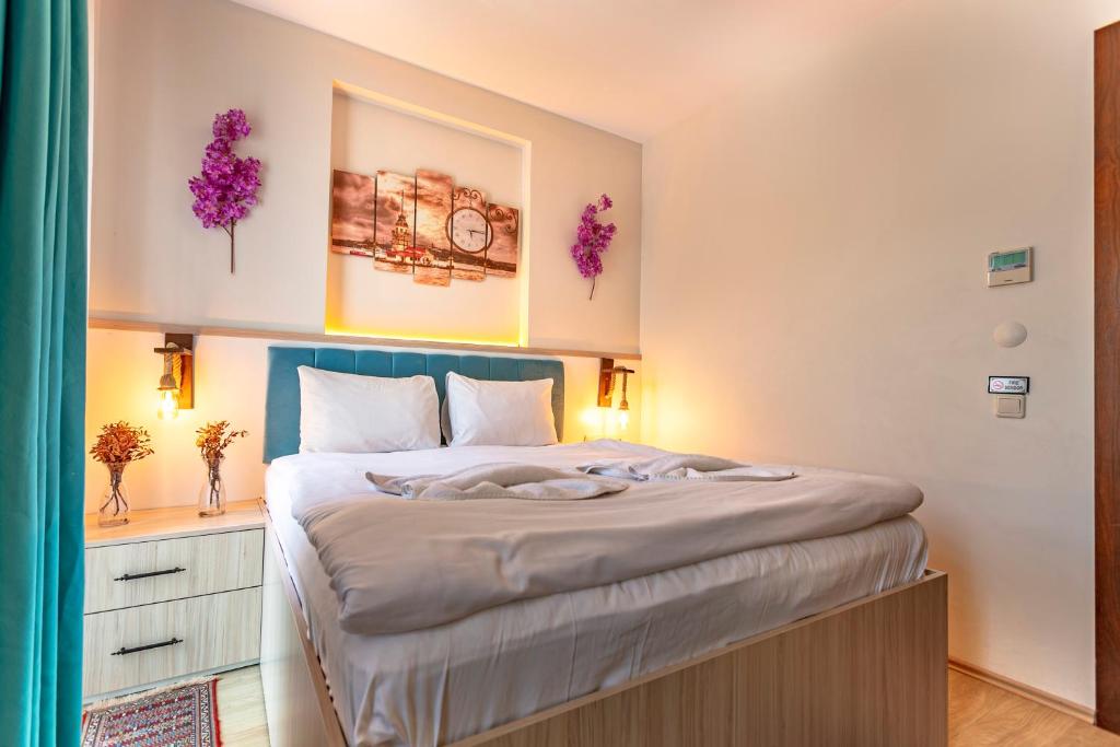 Postel nebo postele na pokoji v ubytování Stanpoli Hostel