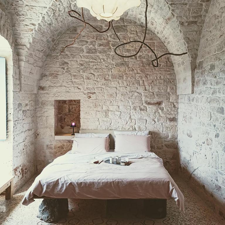 Postel nebo postele na pokoji v ubytování Masseria LoJazzo