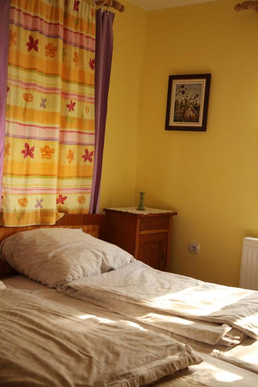 Postel nebo postele na pokoji v ubytování Róka - tanya