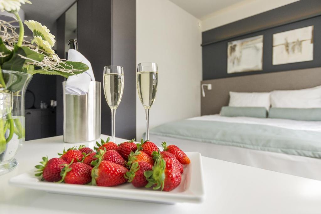 Postel nebo postele na pokoji v ubytování So Stay Hotel
