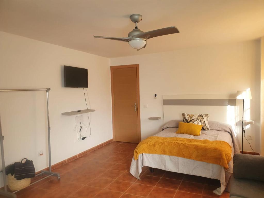Posteľ alebo postele v izbe v ubytovaní Loft 1 Nuevo primer piso sin ascensor,wifi