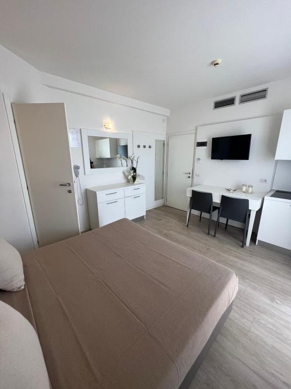 Kuchyň nebo kuchyňský kout v ubytování Hotel Ardea