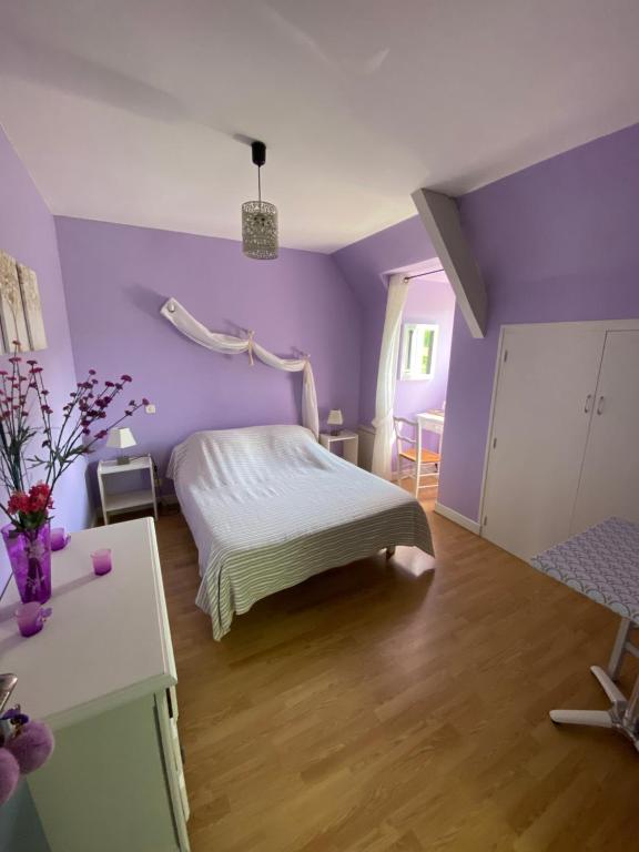 Postel nebo postele na pokoji v ubytování Moulin de Latouille