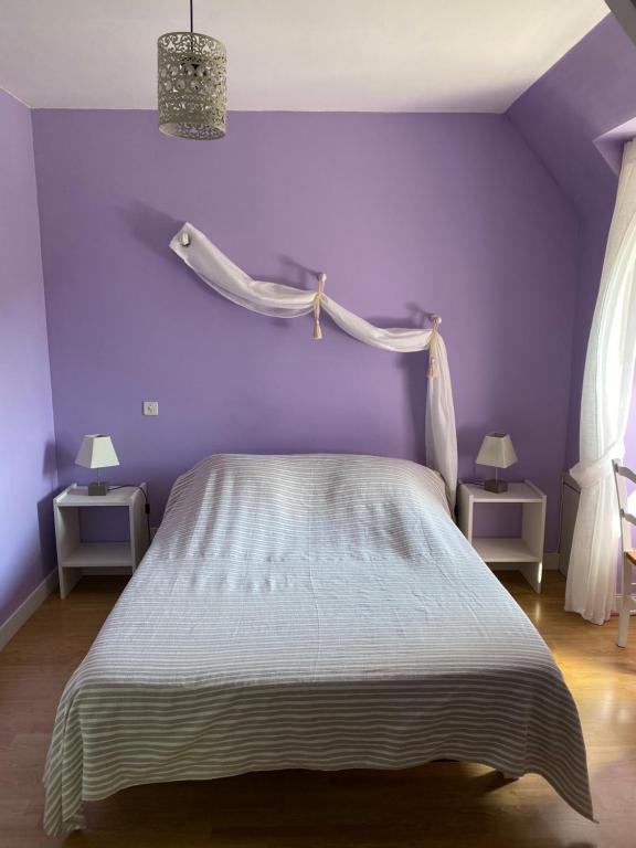 Postel nebo postele na pokoji v ubytování Moulin de Latouille