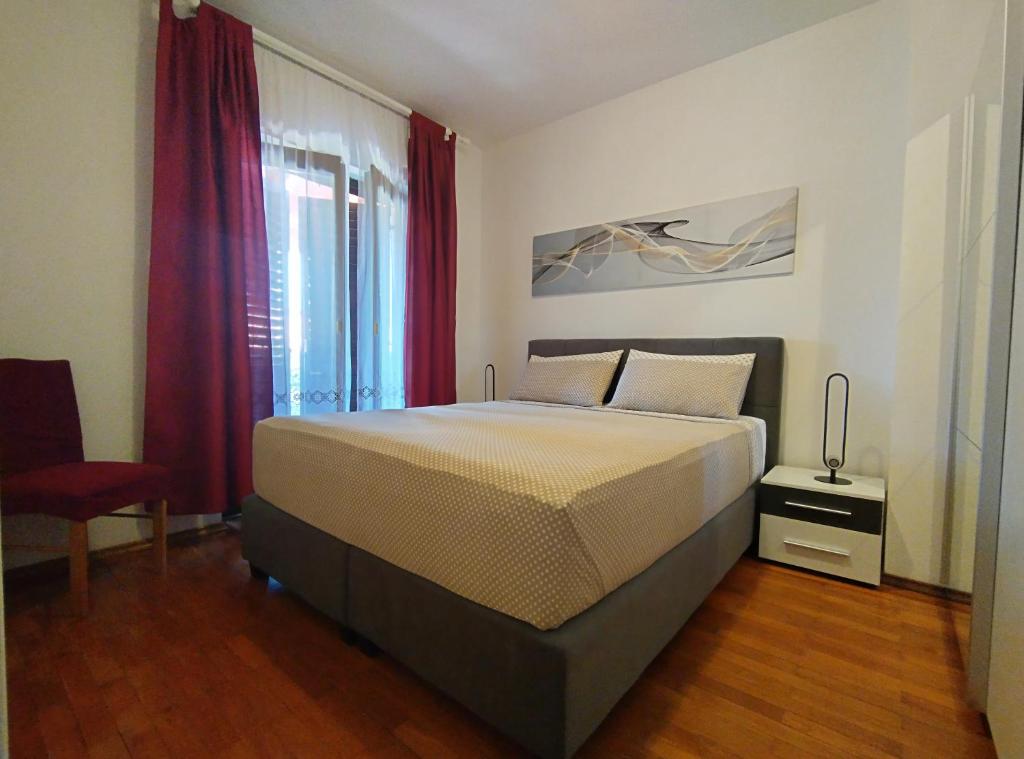 Postel nebo postele na pokoji v ubytování Villa Milan