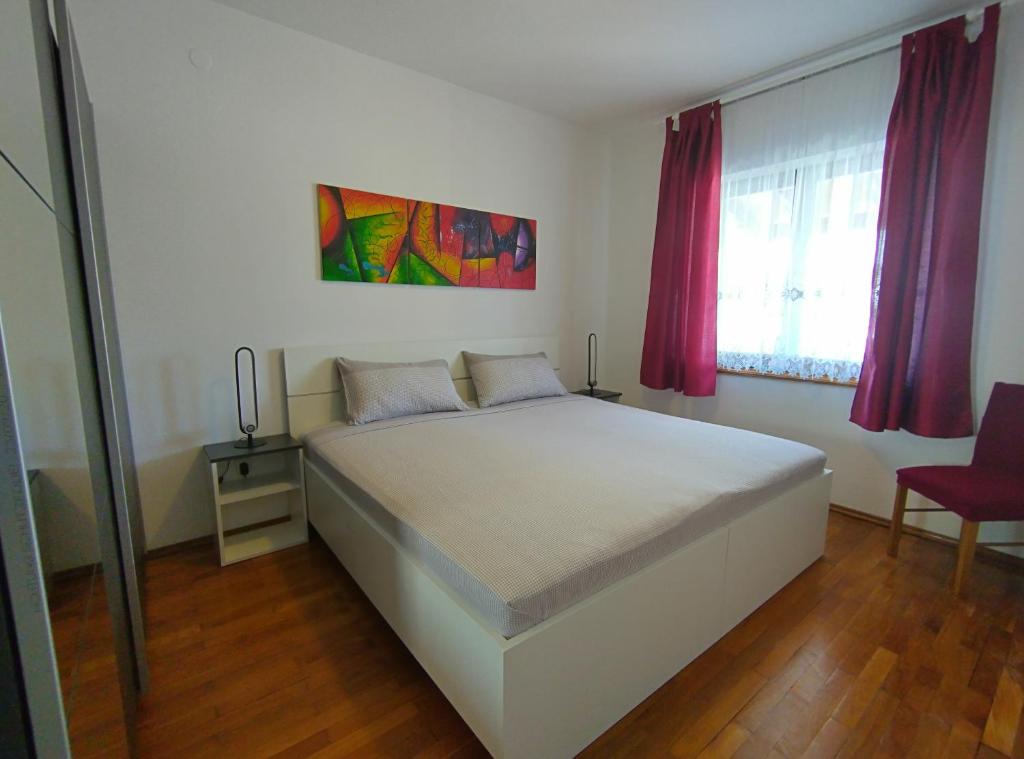 Postel nebo postele na pokoji v ubytování Villa Milan
