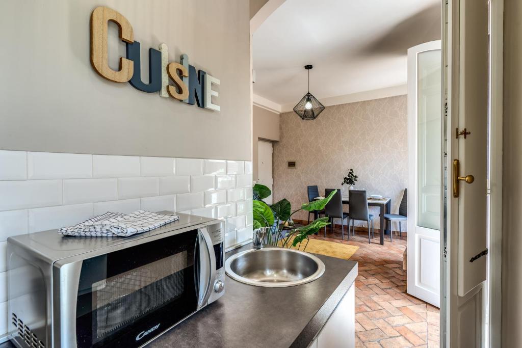 Kuchyňa alebo kuchynka v ubytovaní Maison Babuino