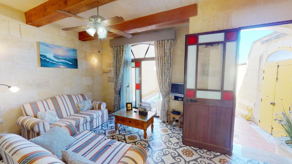 Istumisnurk majutusasutuses Qala Bed&Breakfast with swimming pool - IL-Wenniessa