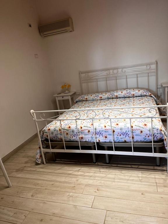 Postel nebo postele na pokoji v ubytování B&B Colle Acquabella