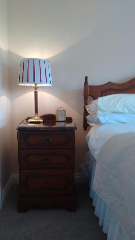 Postel nebo postele na pokoji v ubytování Corrib View Guesthouse h91rr72