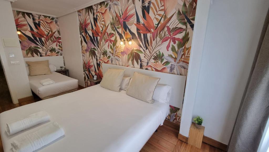 Postel nebo postele na pokoji v ubytování Hotel Norte