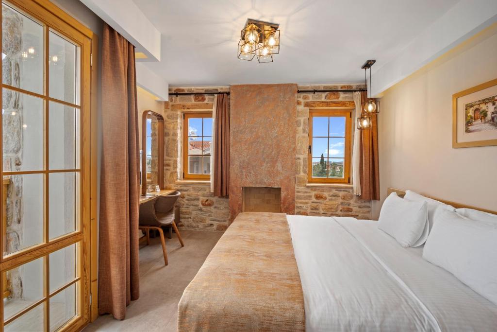 Postel nebo postele na pokoji v ubytování ZEYT INN HOTEL