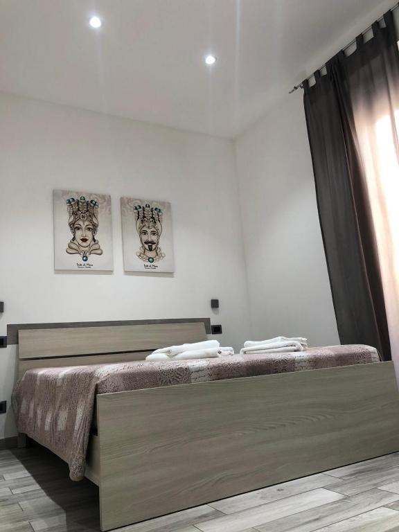 Łóżko lub łóżka w pokoju w obiekcie Sunrise Beach Apartment Trapani