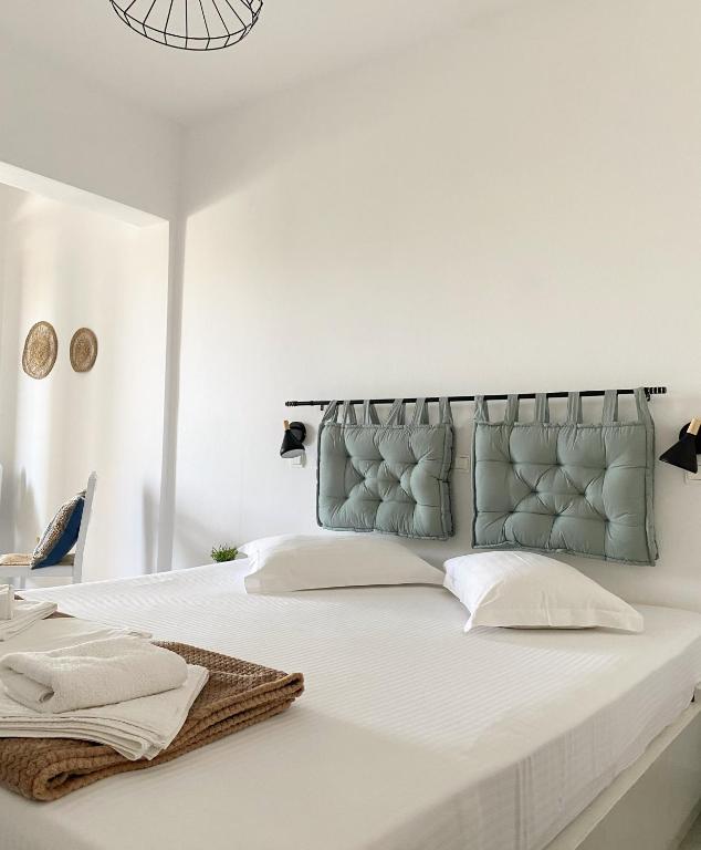 Postel nebo postele na pokoji v ubytování Fikas Hotel