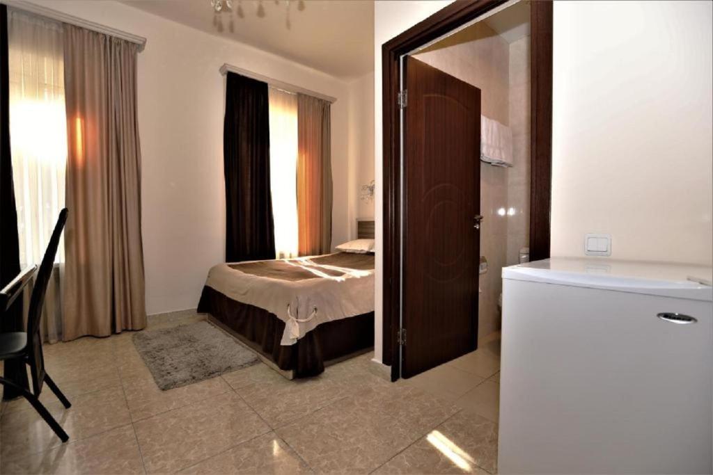 Postel nebo postele na pokoji v ubytování Comfort House Hotel