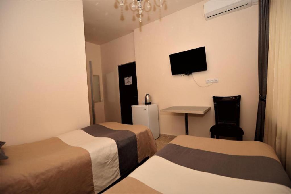 Postel nebo postele na pokoji v ubytování Comfort House Hotel