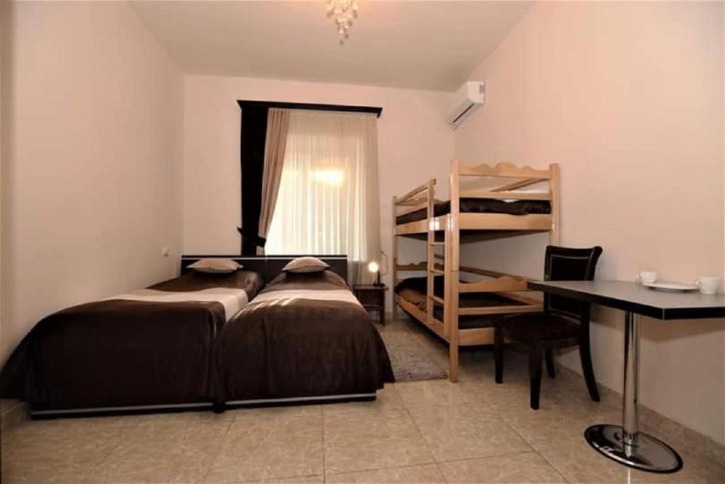Postel nebo postele na pokoji v ubytování Comfort House Hotel
