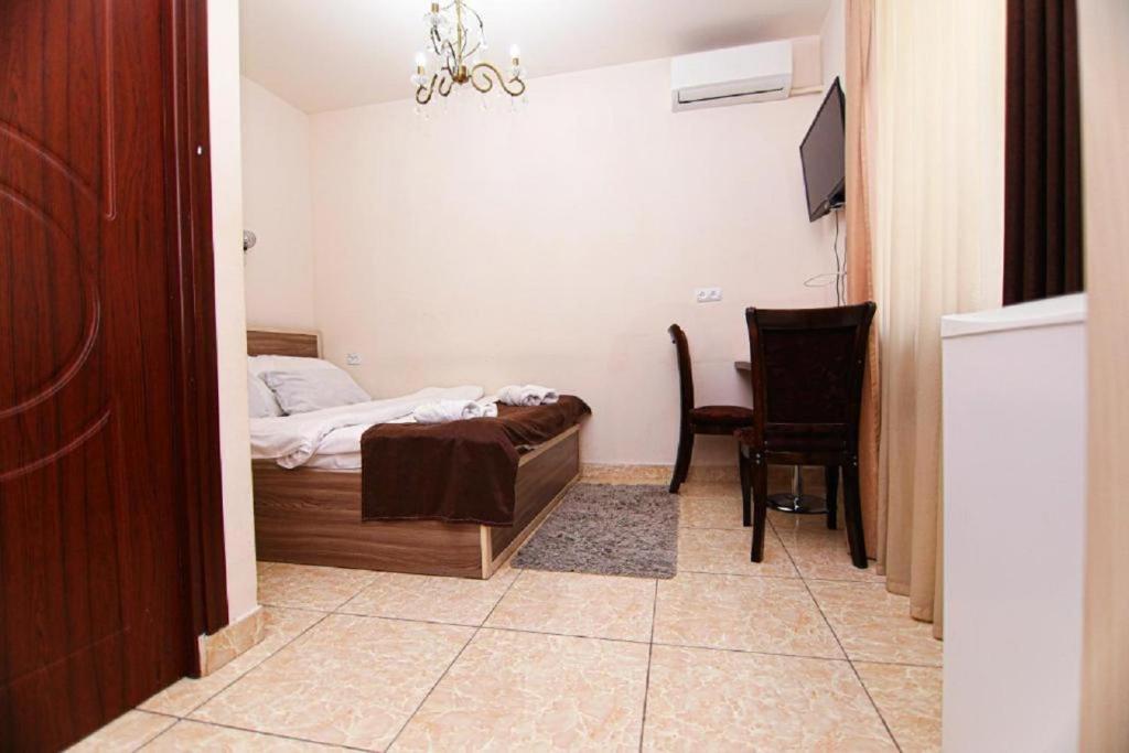 Postel nebo postele na pokoji v ubytování Comfort House Hotel