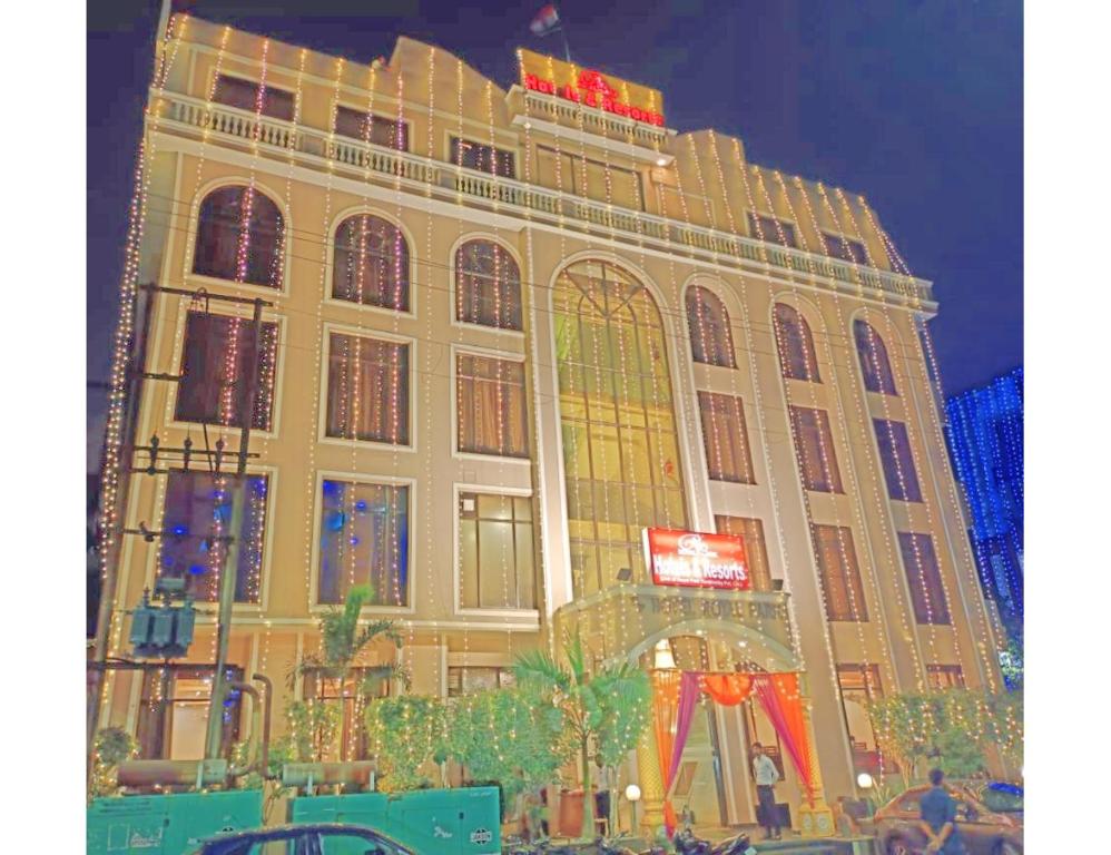 a large building with stained glass windows at night at Royal Park-Hotels & Resorts, Ghaziabad in Ghaziabad