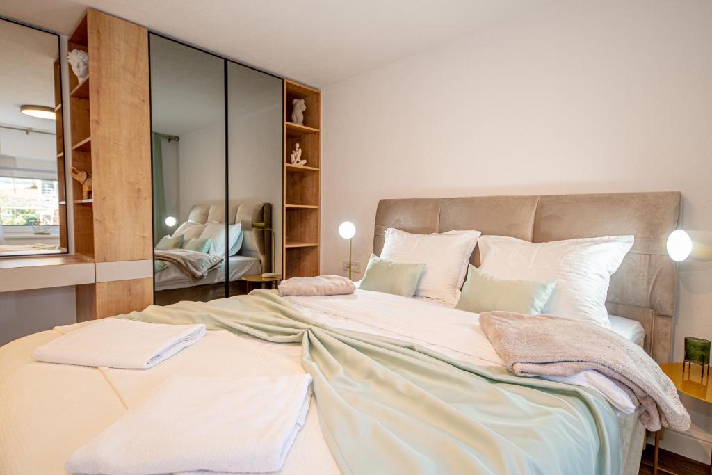 Postel nebo postele na pokoji v ubytování N&N Lux Guest house