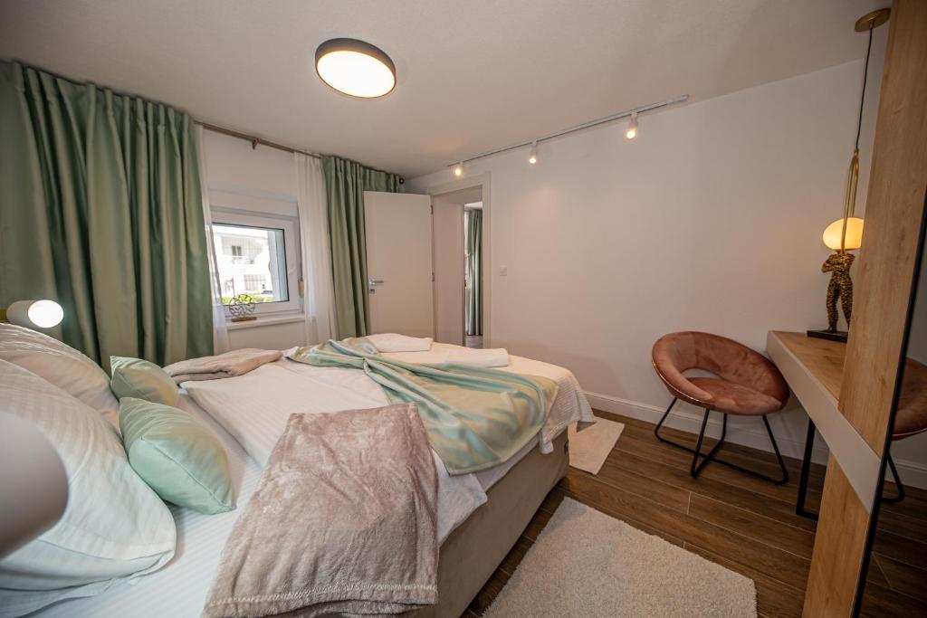 Postel nebo postele na pokoji v ubytování N&N Lux Guest house