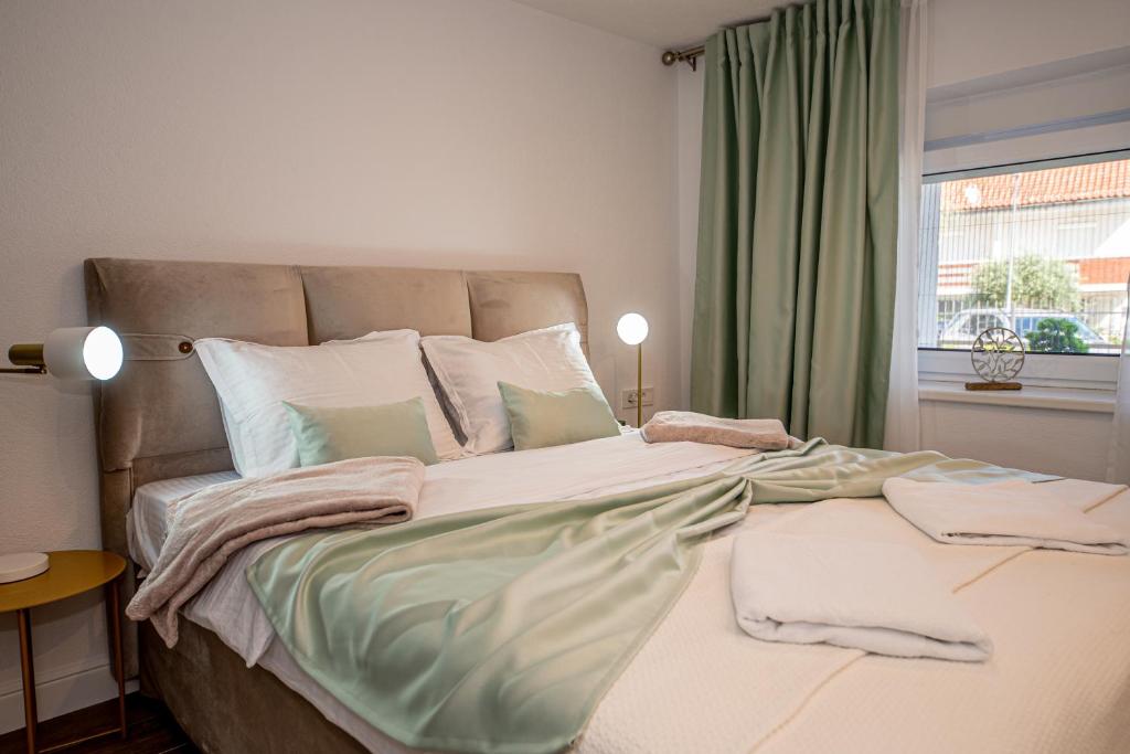 Postel nebo postele na pokoji v ubytování N&N Lux Guest house