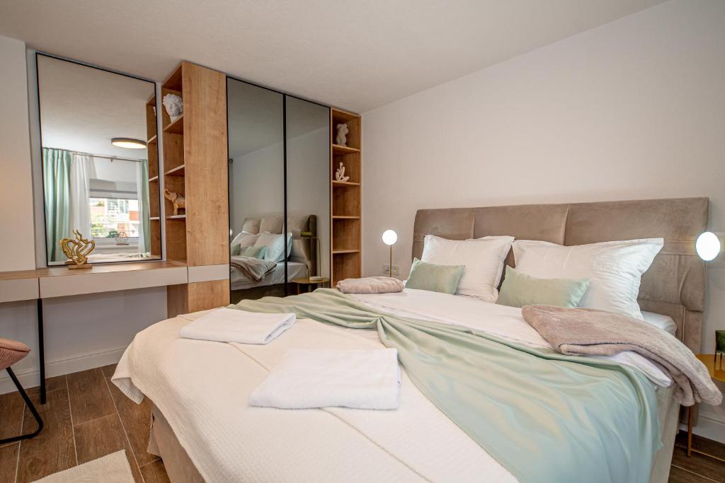 Postel nebo postele na pokoji v ubytování N&N Lux Guest house